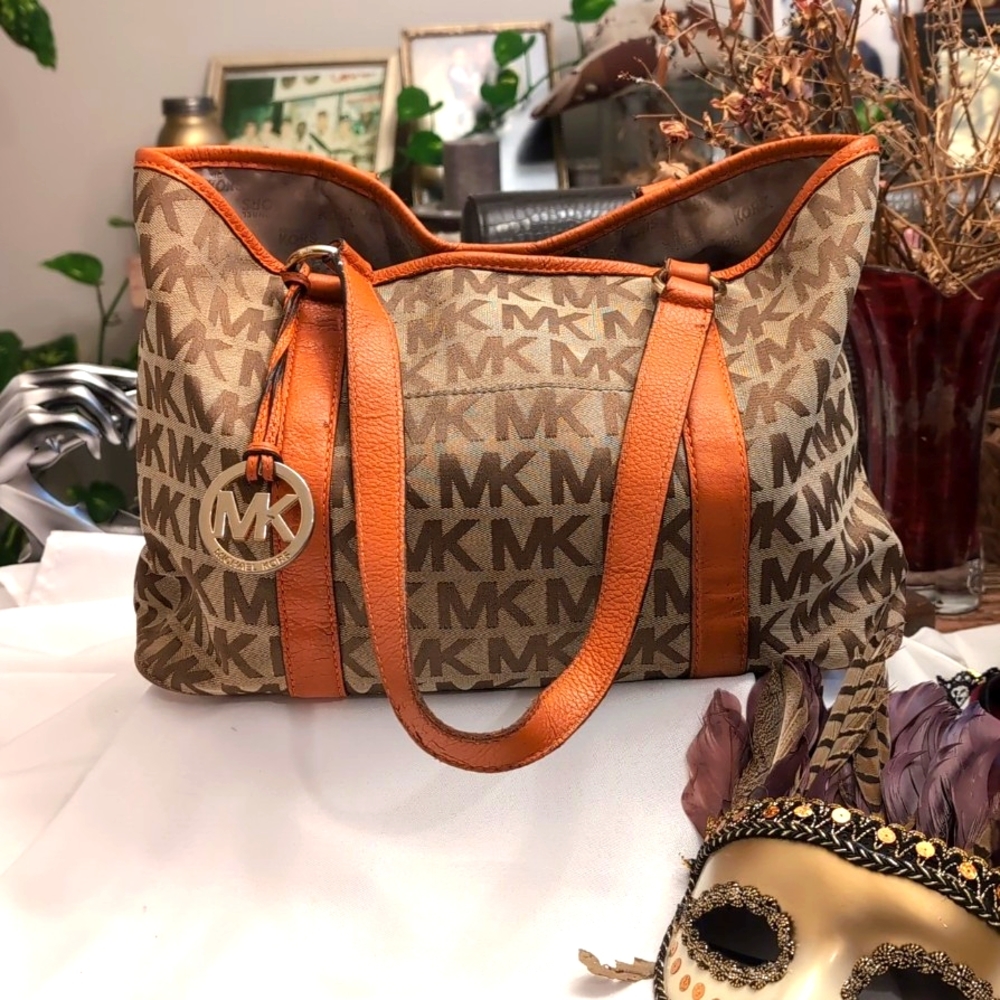 Michael Kors tan and brown handbag.